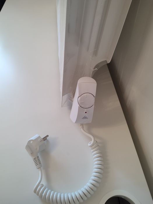 Електрична батарея (радіатор) з теном який не пересушує повітря