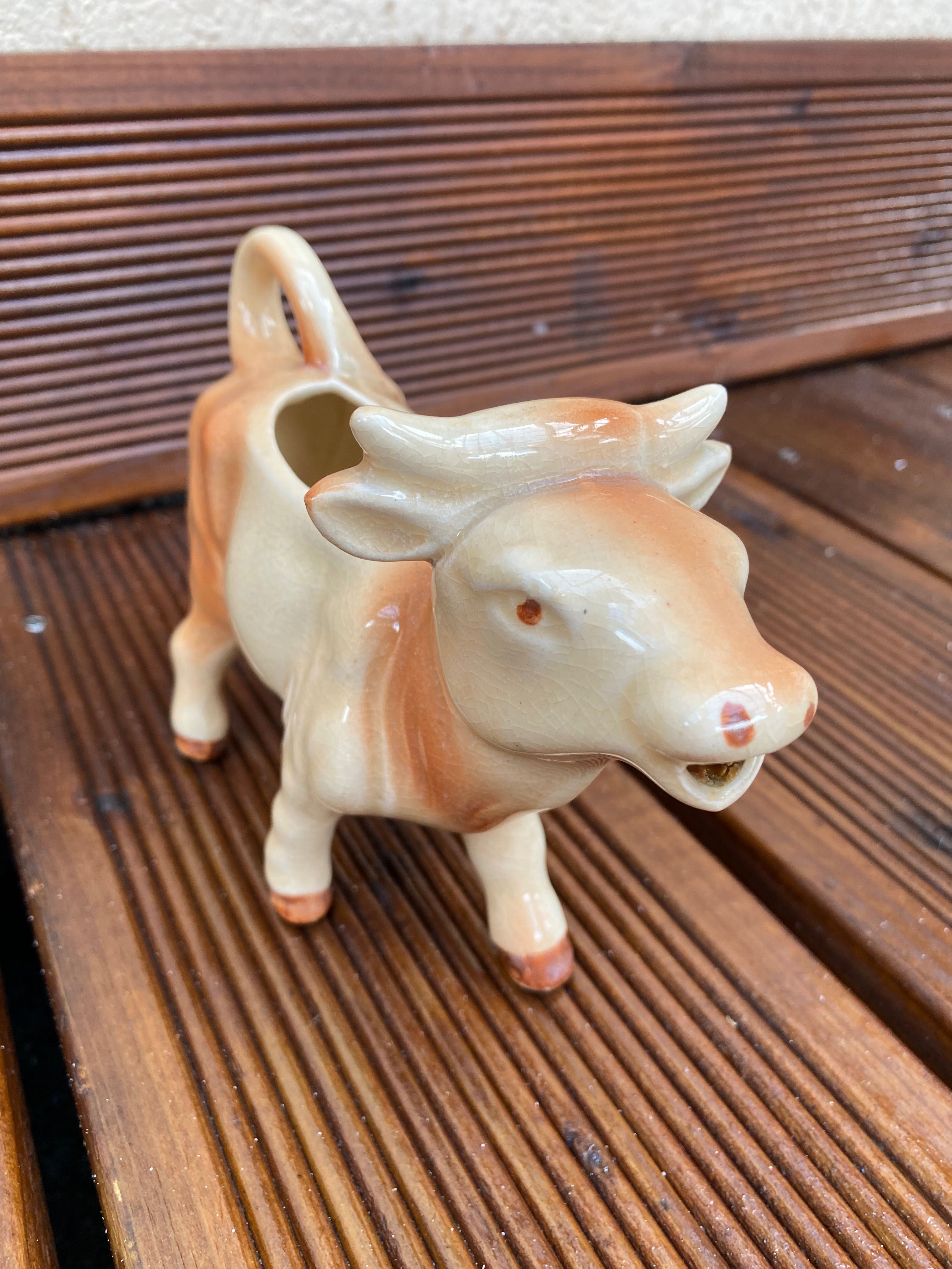 Porcelanowa krowa mlecznik