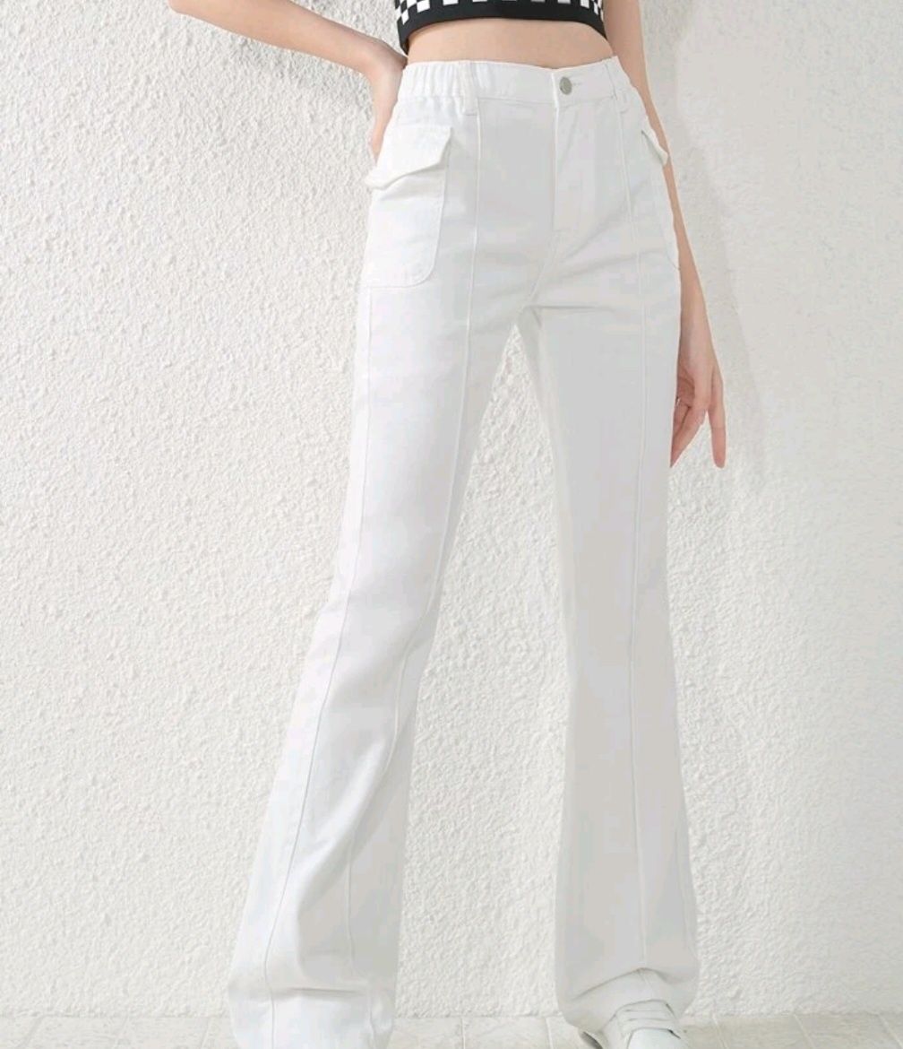 Białe jeansy r. 158
