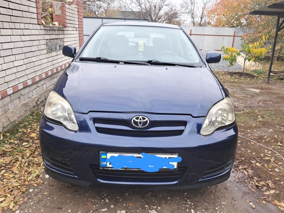 Тойота корола е120