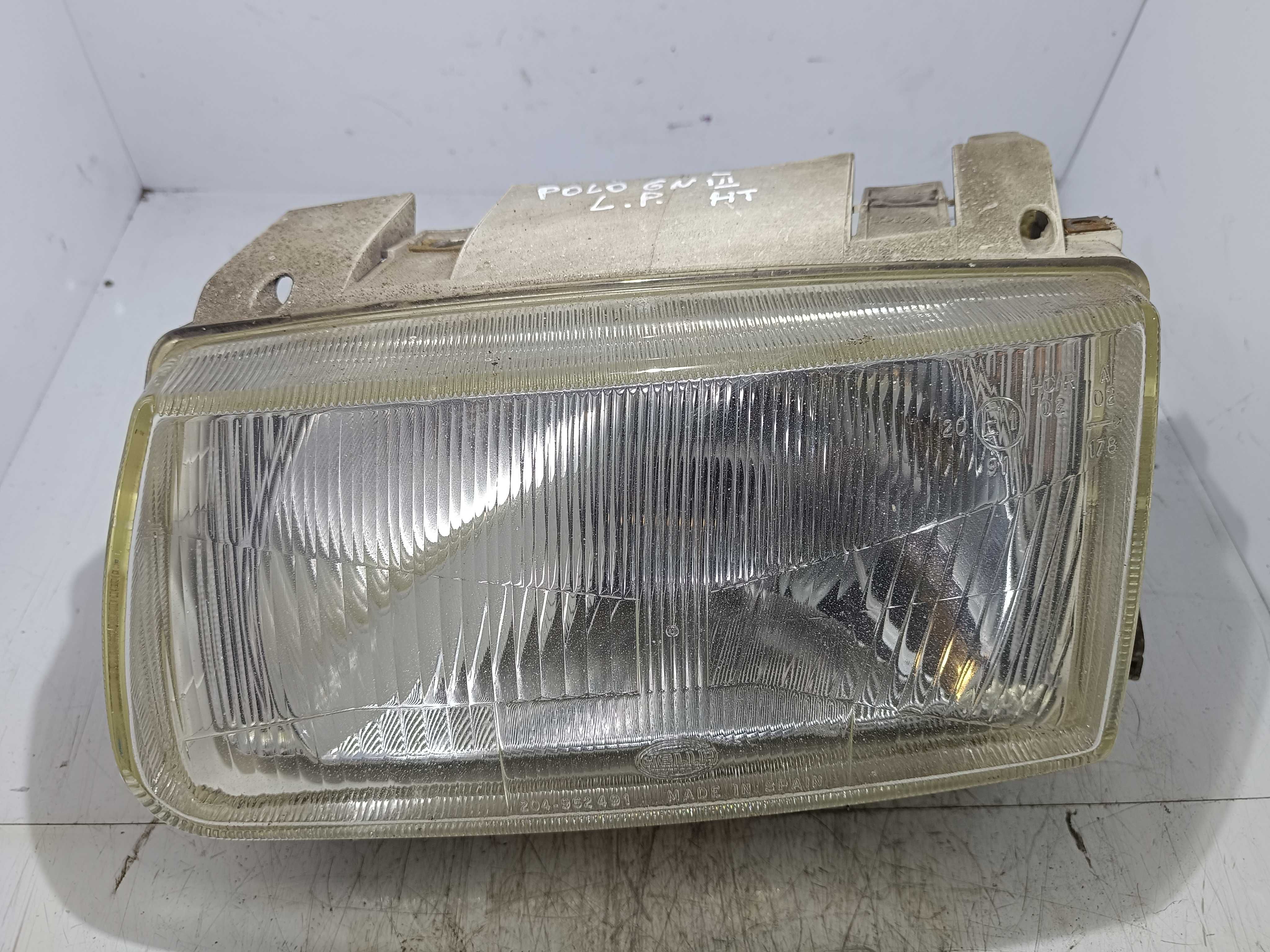 Lampa przednia lewa VW POLO 6N H.T