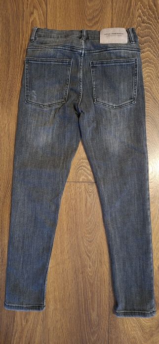 Jeansy dla chłopca Zara 140