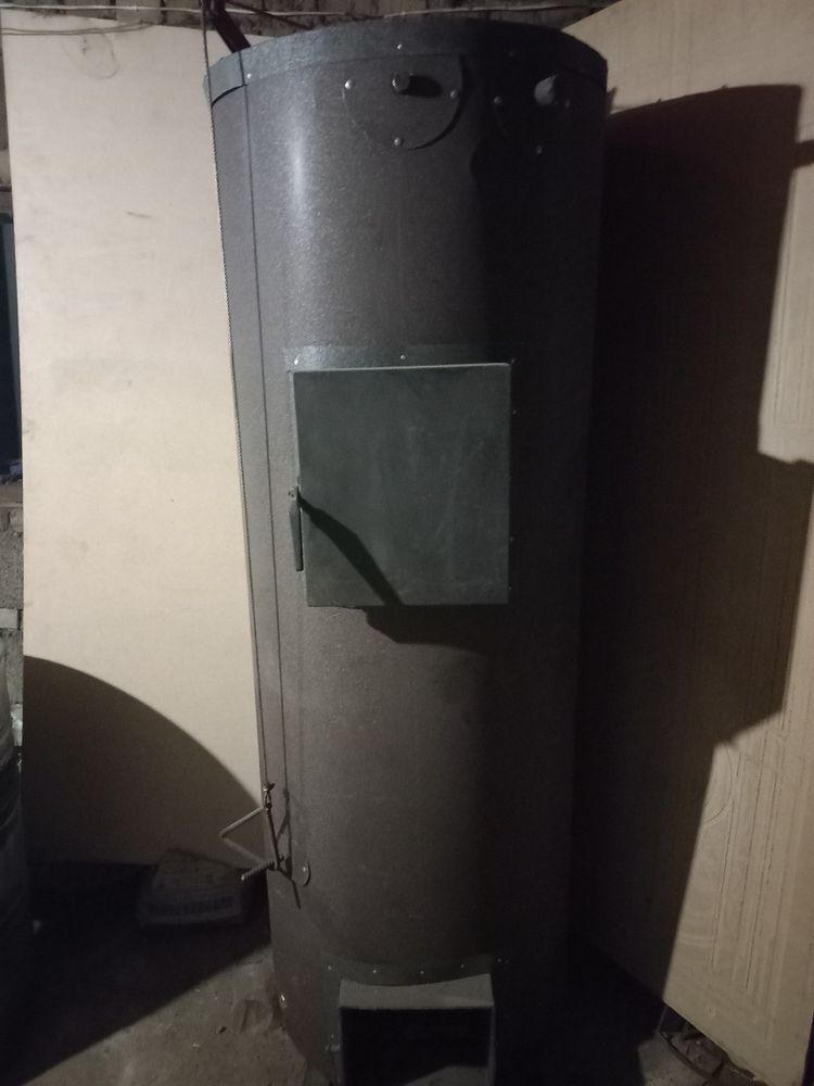Твердопаливний котел тривалого горіння на природній тязі