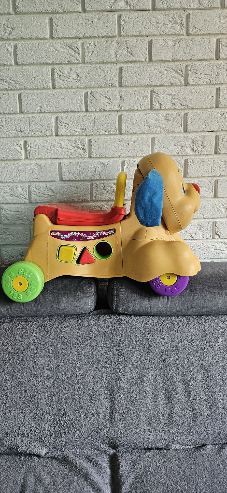 Jeździk-pchacz piesek Fisher Price