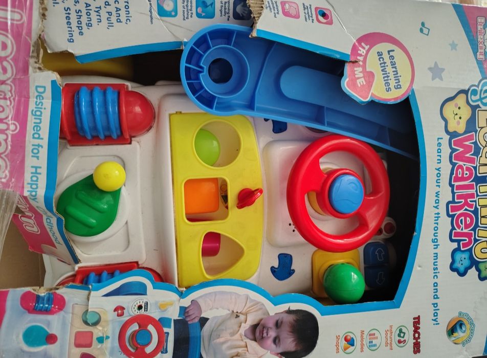 Музичні ходунки,ігровий центр, дитячий автомобіль