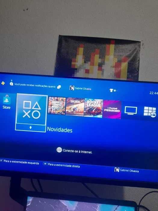 PS4 500GB + 2 comandos originais + base de carregamento TROCO ou VENDO