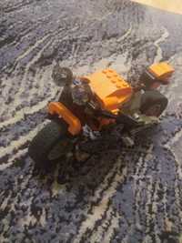 Motor LEGO pomarańczowy