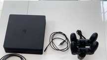 Ps4 slim de 1TB +2 comandos + base de carregador
