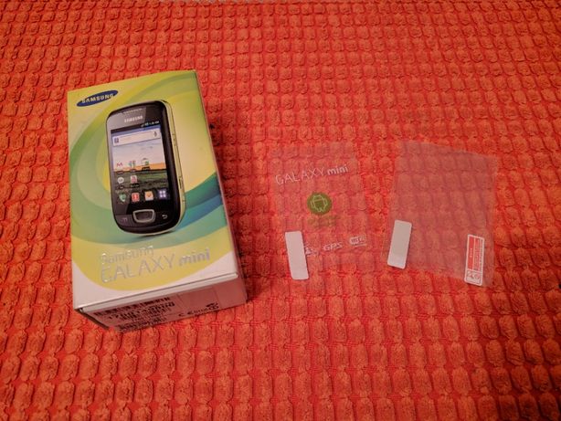 Caixa telemóvel Samsung Galaxy mini com manual e duas películas novas
