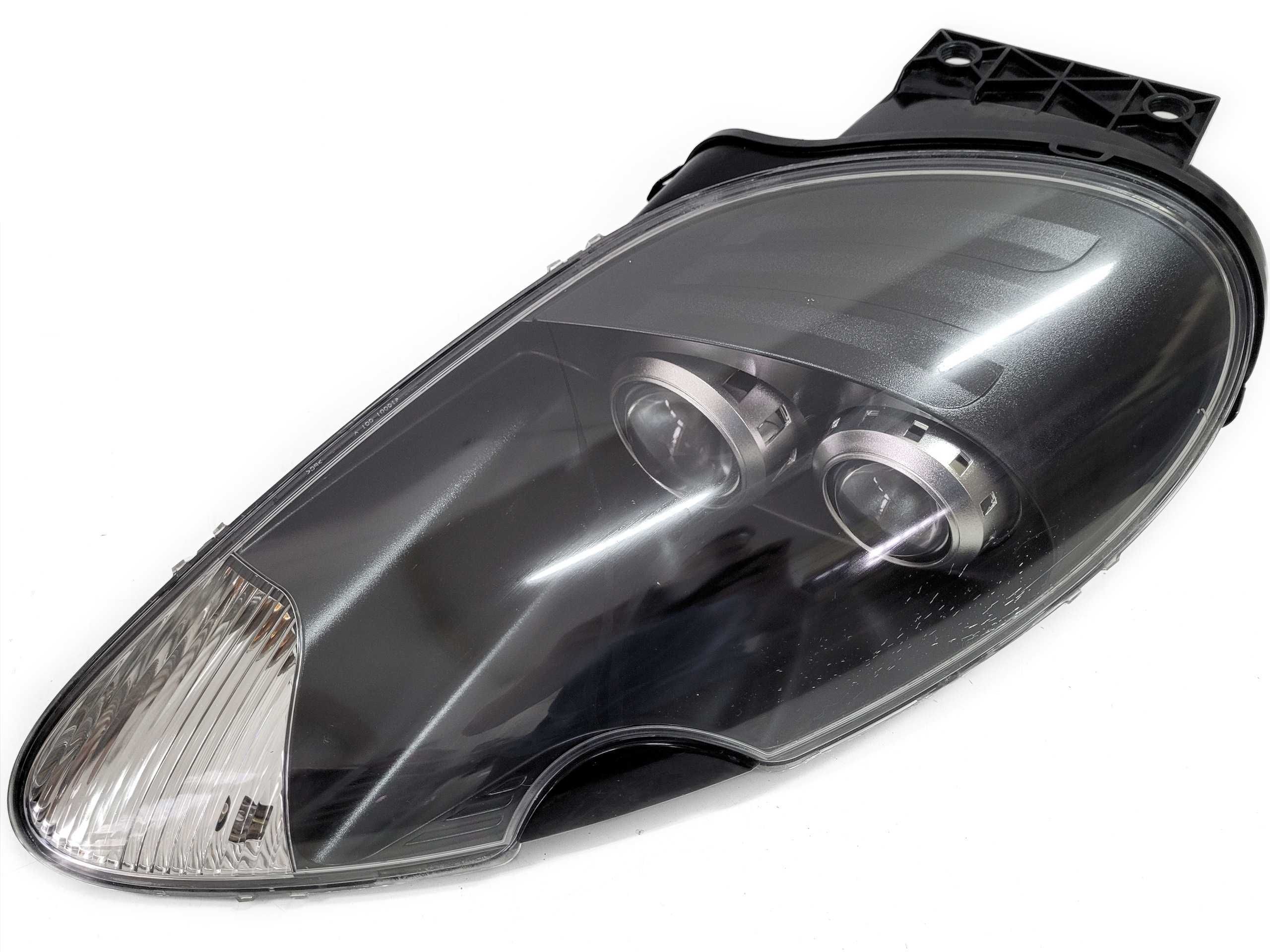 Aston Martin DB9 (04-12), DBS V12 - lampa przednia PRZÓD - LEWA