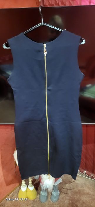 Женское очень нарядное платье .