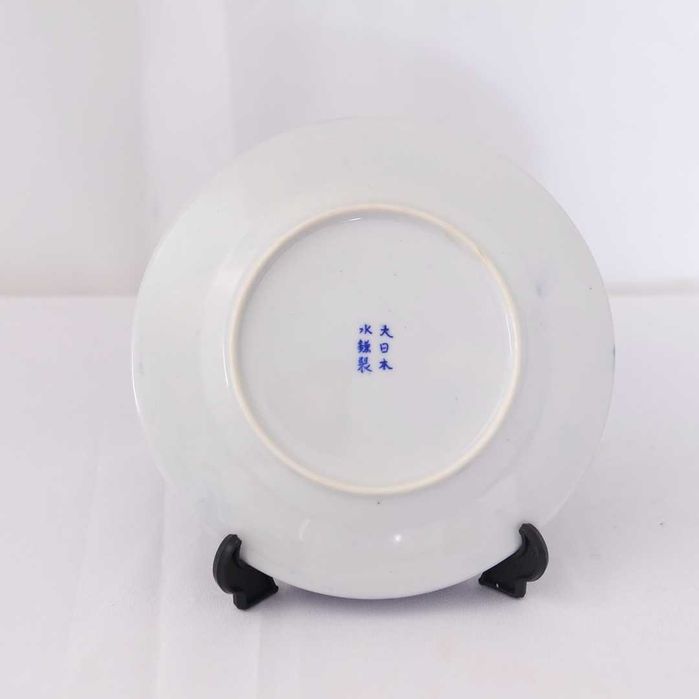 Prato oriental pintado em azul e branco