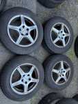 Alufelgi Dezent 15” 5x108 ET48 Opony 195/65/15 Wielosezonowe