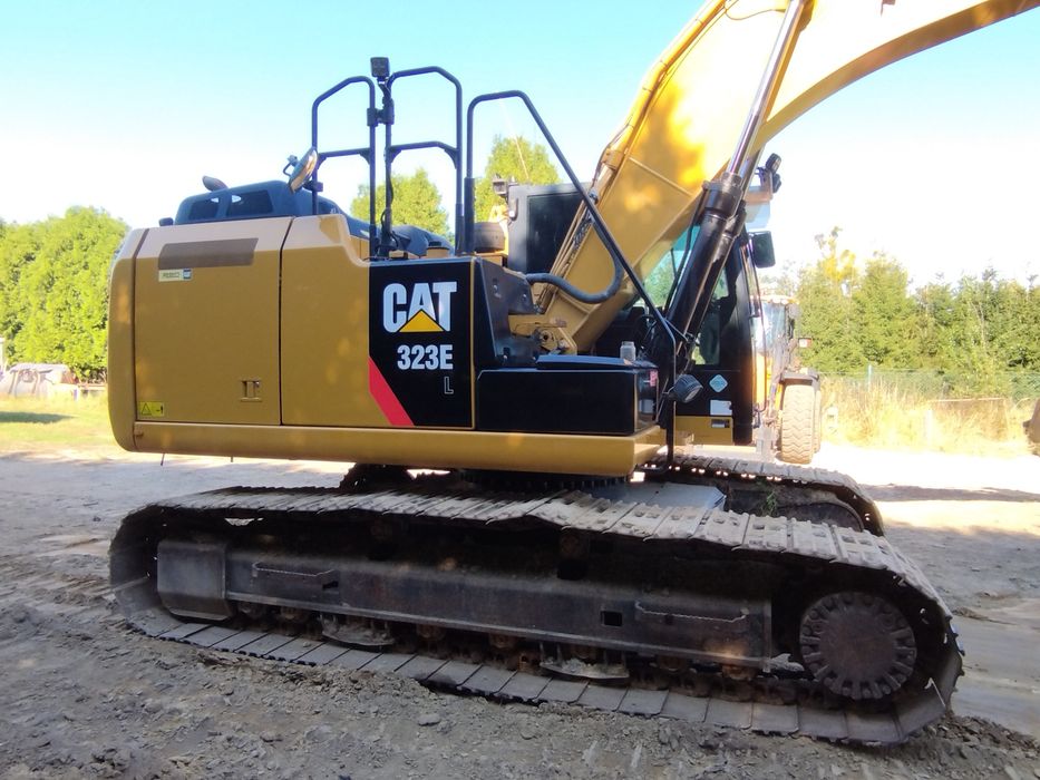 Koparka CAT 323E, gasienica CAT 950M