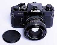 Aparat CANON F-1 + obiektyw Canon SSC 1,2/55- pryzmat lub poziom talii