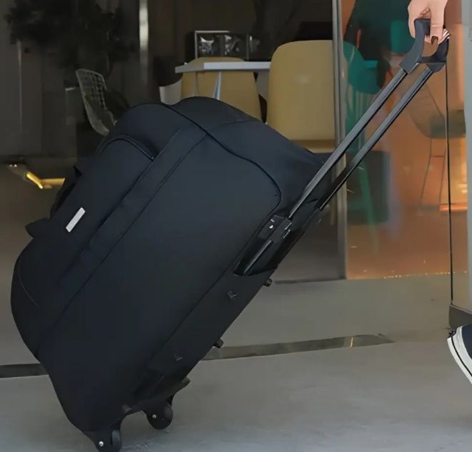 Дорожня валіза на колесах