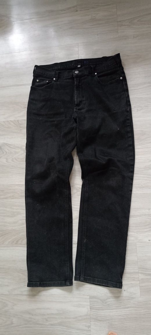 Czarne jeansy marki Multiblue rozmiar 34/30