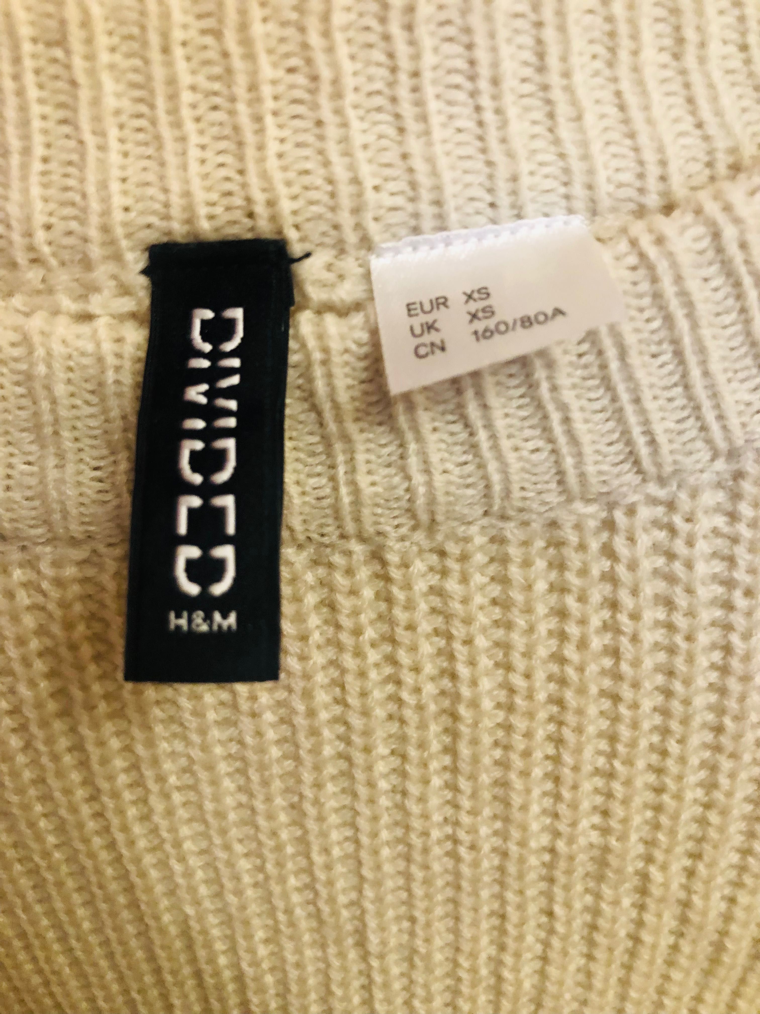 Sweter damski firmy H&M.