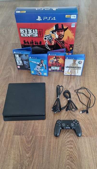PS4 1TB em boas condições + 1 comando + cabos + jogos