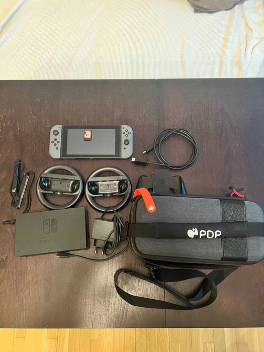 Nintendo Switch Szary + 1,2 Switch Gra + Kierownice + Pokrowiec
