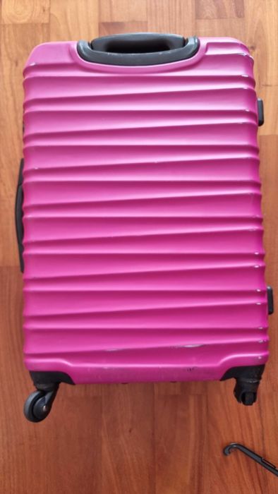 Różowa walizka podróżna Witchen o wymiarach 65x45x27 cm