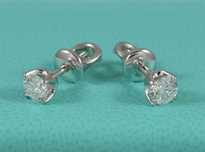 Серьги-пуссеты из белого золота с бриллиантами в стиле Tiffany