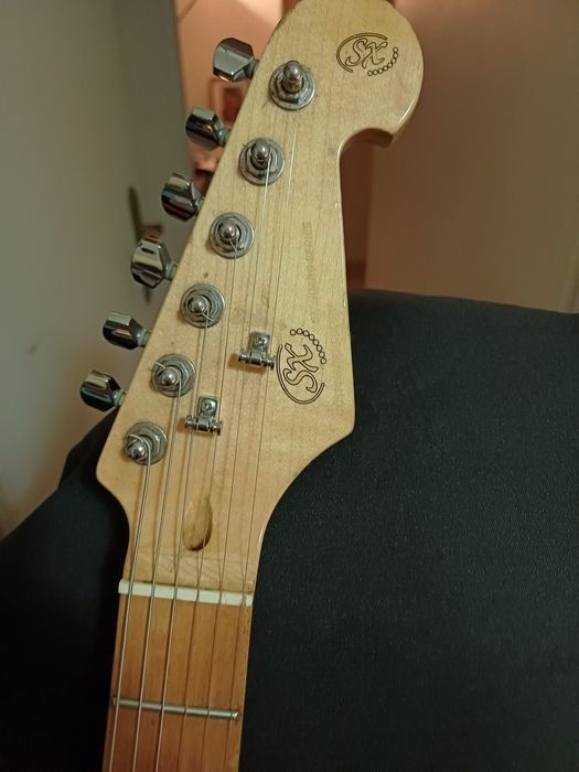 Guitarra telecaster SX e amplificador