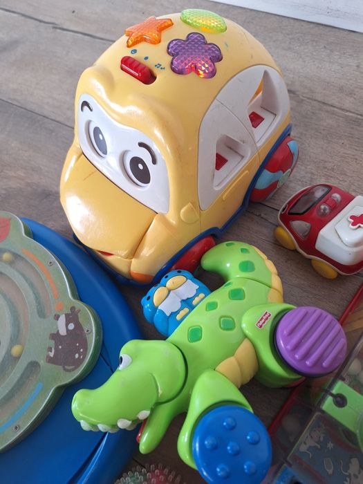 Paczka zabawek Vtech Fisher Price grające sensoryczne