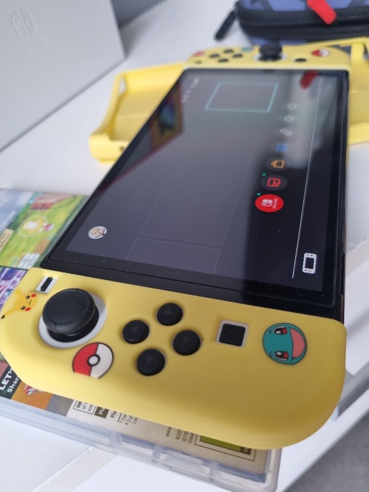 Nintendo Switch Oled + dodatki (gra pokemon, etui)