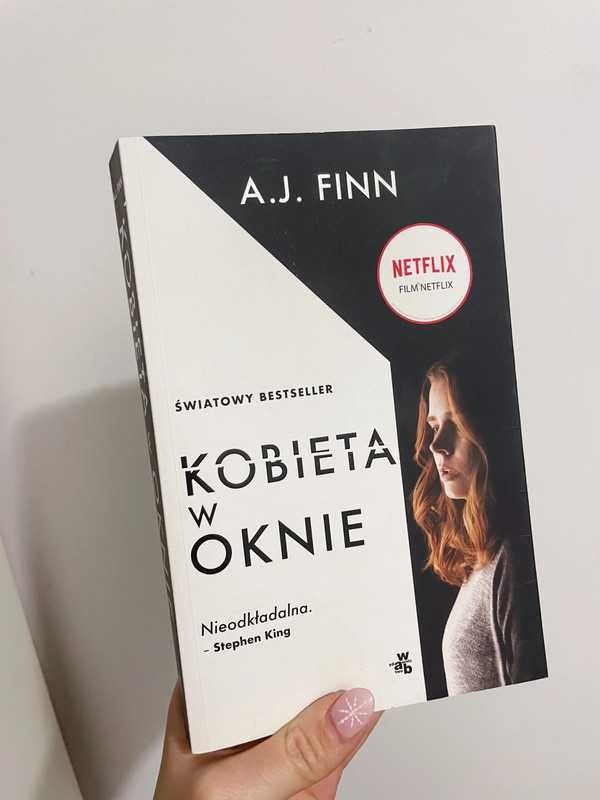 Książka A.J. Finn - Kobieta w oknie - wydanie filmowe Netflix W.A.B.