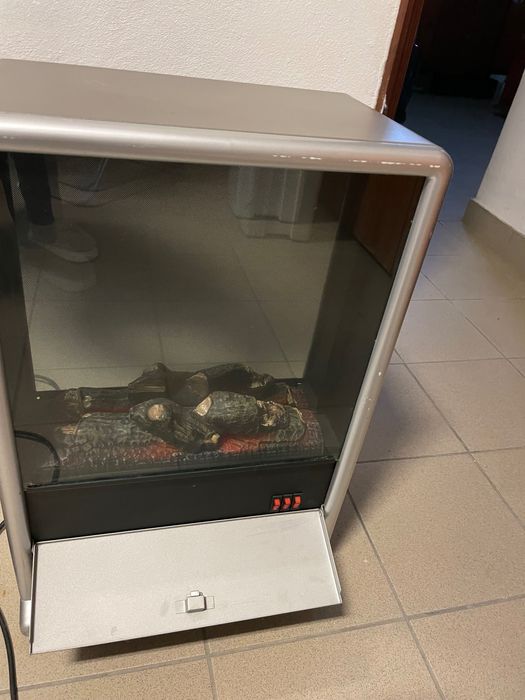 Vendo Aquecidor efeito de lareira com ambiente acolhedor