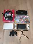 Nintendo Switch OLED + 3 gry + etui – komplet, bardzo dobry stan