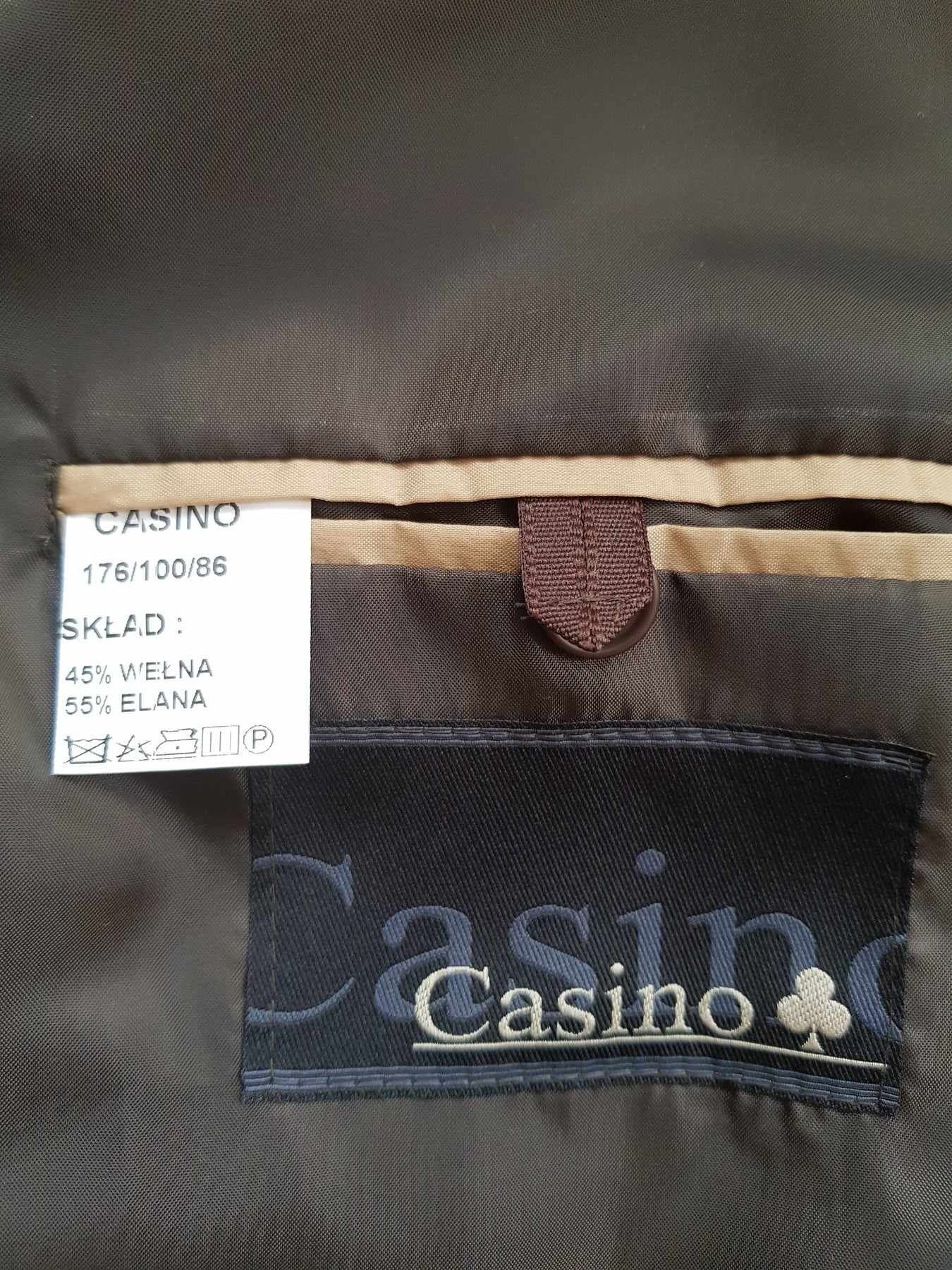 NOWY garnitur męski CASINO 176/100/86 45 % wełna WYPRZEDAŻ okazja