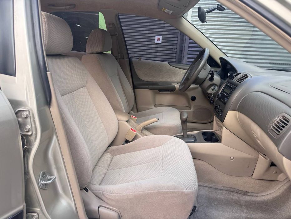 Mazda 323 (Protege) 2003