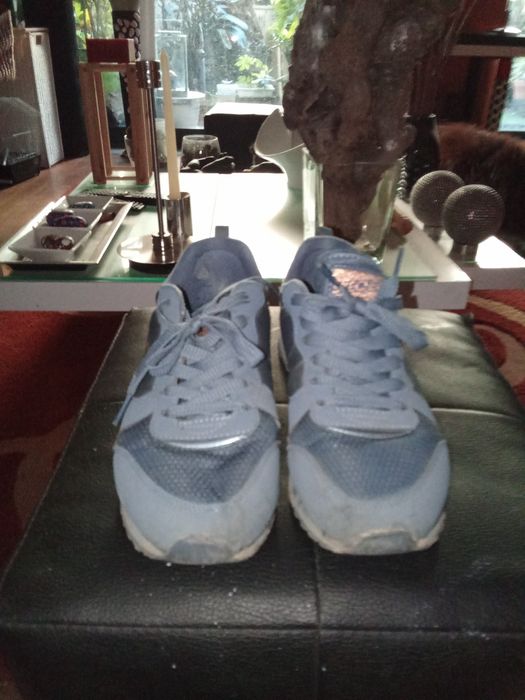 Tênis unisexo em bom estado