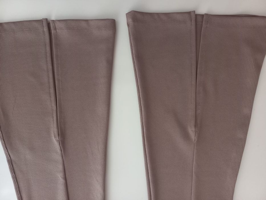 Штани кльоші з розрізами.