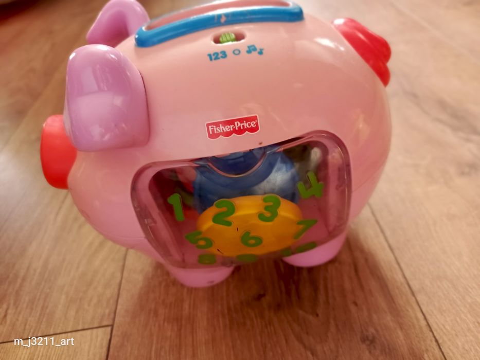 Świnka skarbonka Fischer Price