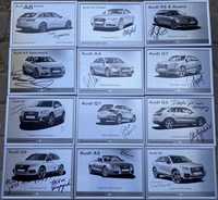 Autografy na tabliczkach z modelami Audi