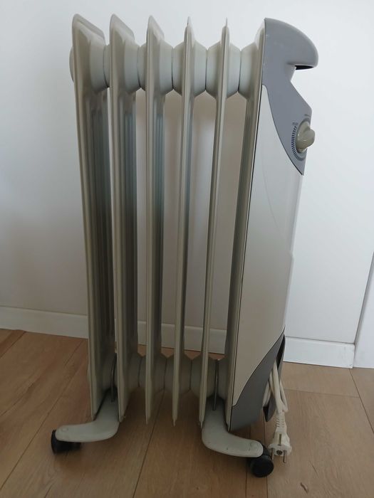 Масляний радіатор обігрівач камін EWT Germany