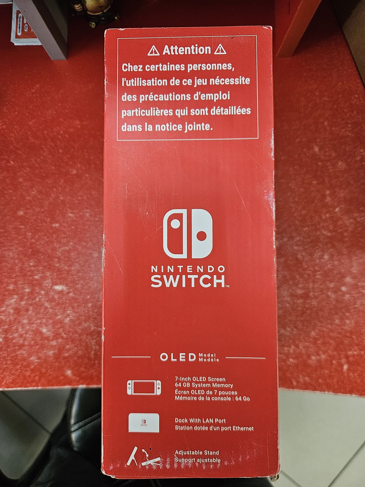 Nintendo Switch OLED with Neon Blue and Neon Red Joy-Con