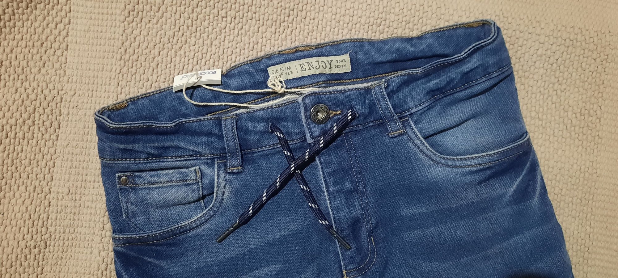 Jeansy Pocopiano roz. 152