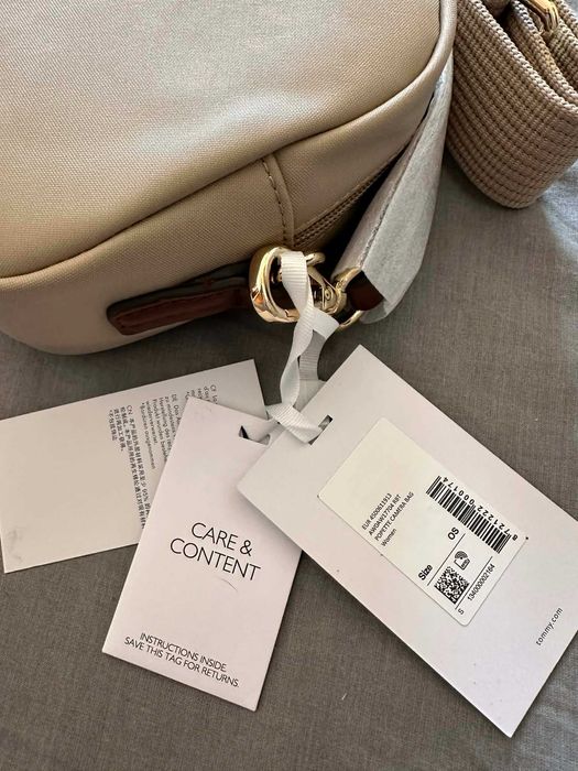 mala tommy nova e original