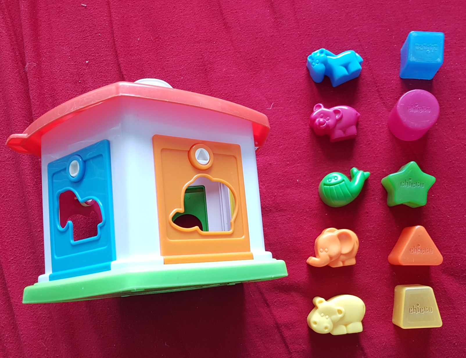 2 edukacyjne sortery- DOMEK z kluczykami Chicco i żyrafa Fisher Price