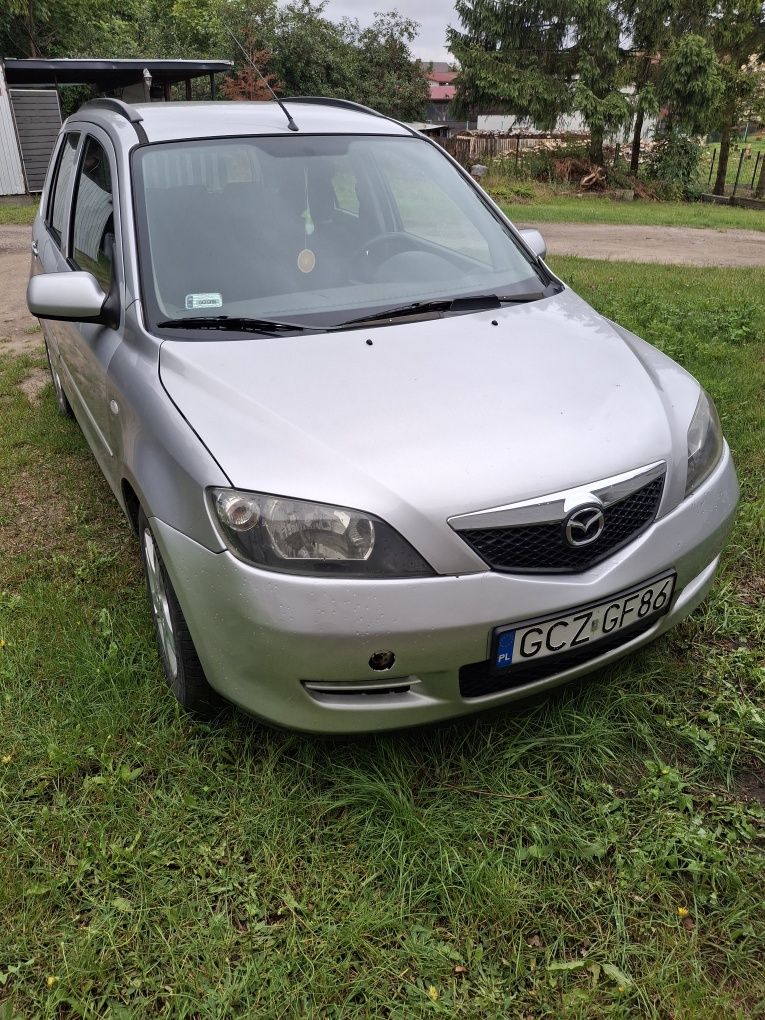 Sprzedam mazdę klima ,alu sprawne