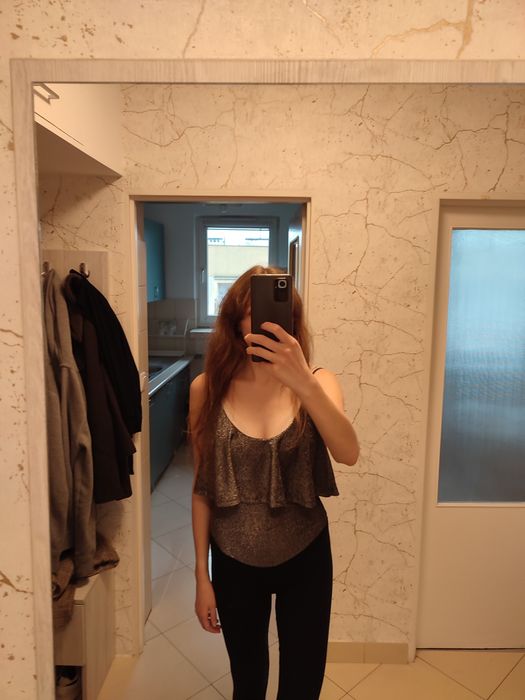 Błyszczące damskie body