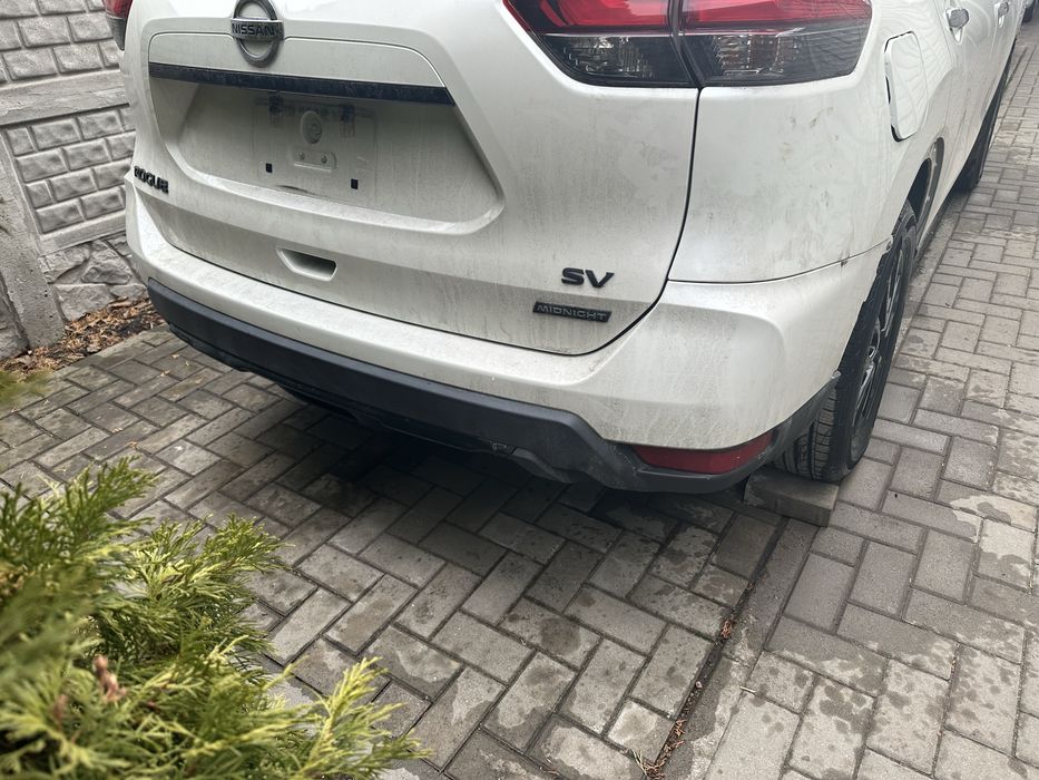Задний бампер Nissan Rogue цвет QAB