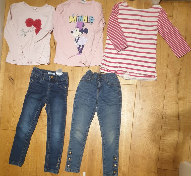 Zestaw ubranek dla dziewczynki 116-122 bluzeczki jeansy