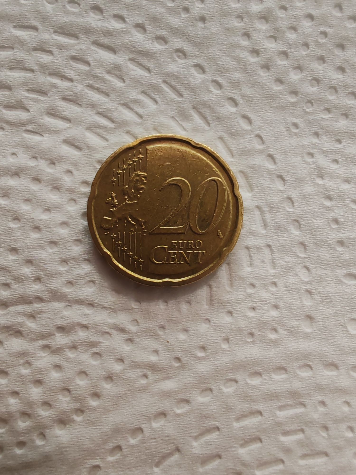 moeda de 20 cêntimos de euro da Letónia, cunhada em 2014.
