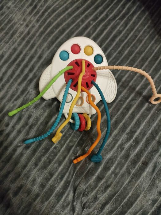 Погремушка прорезыватель 4в1