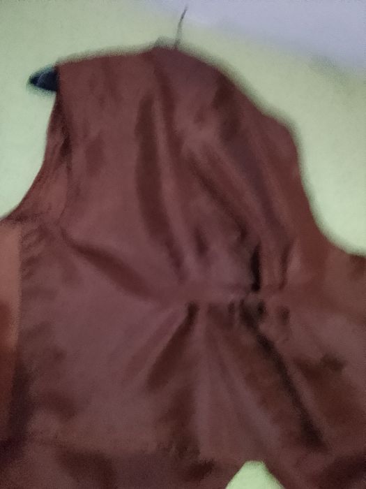 Vendo colete em em carmorça pele genuína